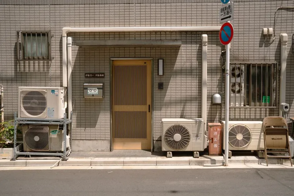 Air conditioning units mounted on a building after the job