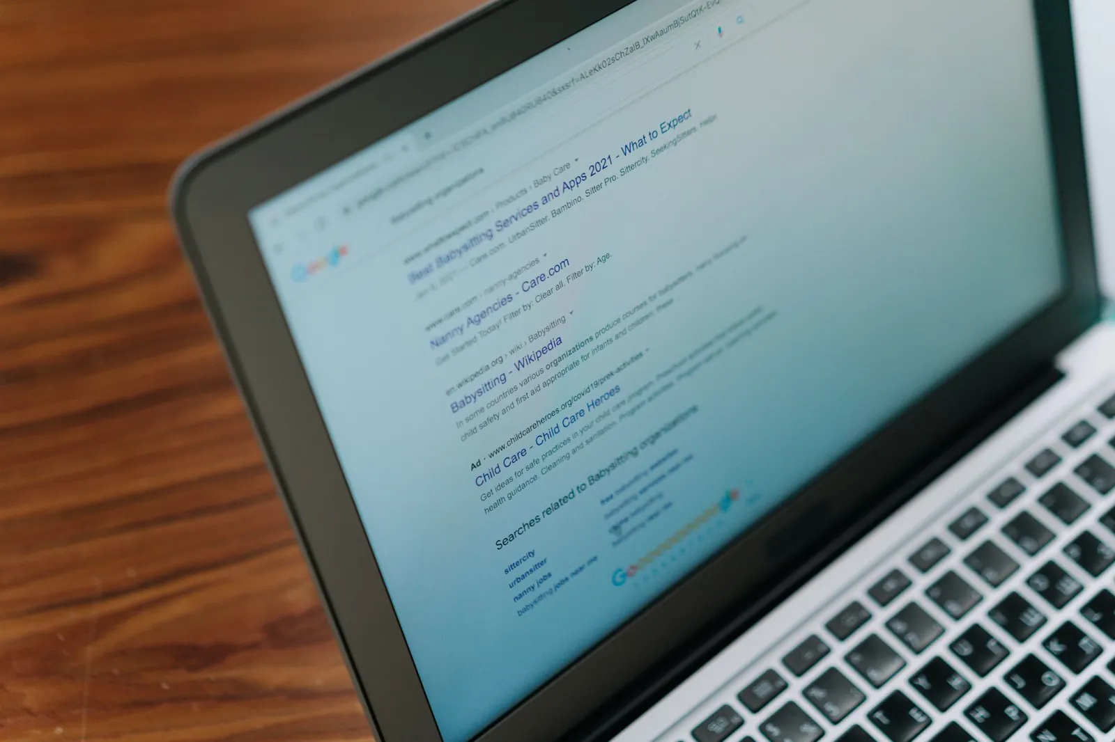 Google search results open on a laptop, where SEO for plumbers decides who gets the call